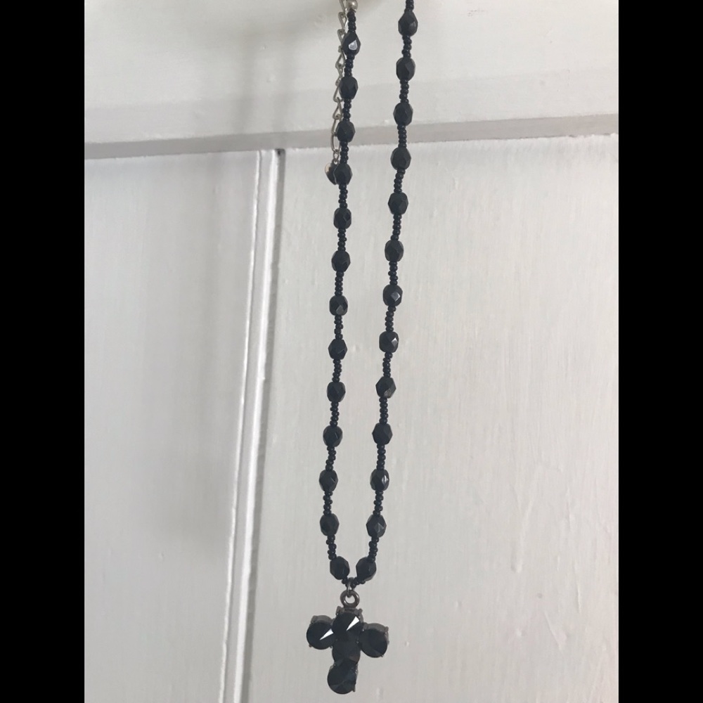 Black beaded necklace with cross pendant